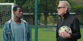 Micheal Ward, Bill Nighy in The Beautiful Game