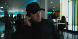 Jason Bateman come Traveler in Carry-On