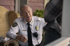 William Hope come Chief Isaacs in Bagman