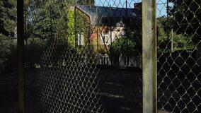 Tempi Nuovi di François Caillat - Le tennis du directeur