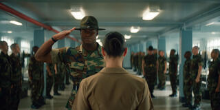 (S-D) Cedrick Cooper come Sgt. McKinnon e Ana Ayora come Captain Fajaro in Boots 1x01