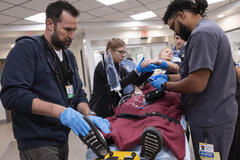 Noah Wyle, Taylor Dearden, Brandon Mendez Homer in The Pitt 1x10